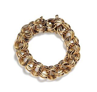 A 14 Karat Yellow Gold Triple Link Chain Bracelet, 45.70 dwts.