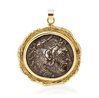 A 14 Karat Yellow Gold and Ancient Alexander the Great Coin Pendant, 14.30 dwts.