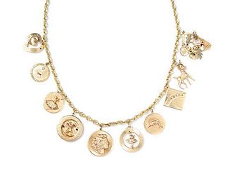 A 14 Karat Yellow Gold Charm Necklace with 10 Attached Charms, 89.90 dwts.