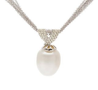 * A 14 Karat White Gold, Diamond and Cultured South Sea Pearl Pendant, 9.00 dwts.