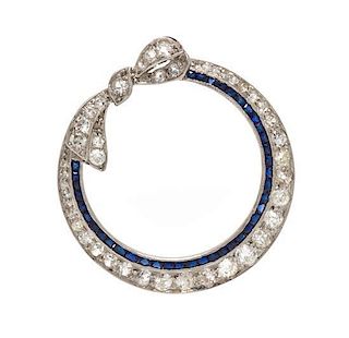 An Art Deco Platinum, Diamond and Synthetic Sapphire Brooch, Circa 1920, 3.80 dwts.
