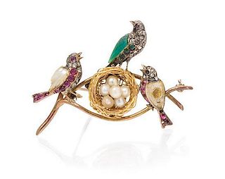 * A Silver Topped Gold, Pearl, Ruby, Diamond and Dyed Chalcedony Brooch, 7.40 dwts.