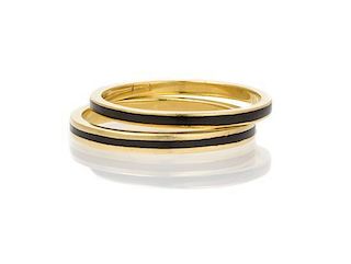 A Pair of 18 Karat Yellow Gold and Enamel Bands, 2.80 dwts.