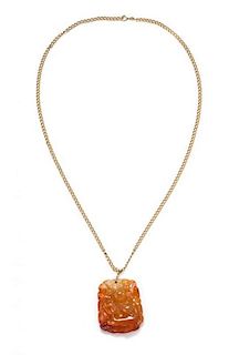 A Yellow Gold and Carnelian Pendant, 6.90 dwts.