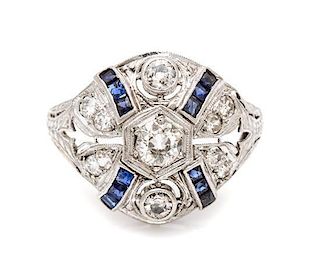 An Art Deco Platinum, Diamond and Sapphire Ring, 2.60 dwts.