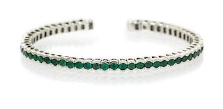 A White Gold and Emerald Cuff Bracelet, 10.20 dwts.