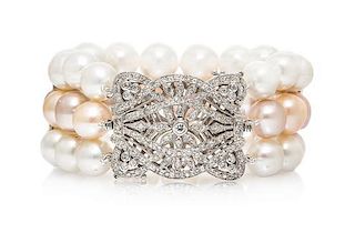 An 18 Karat White Gold, Diamond and Cultured Pearl Bracelet,