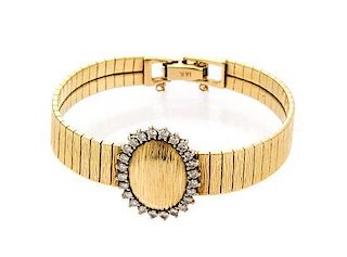 A 14 Karat Yellow Gold and Diamond Bracelet, 14.90 dwts.