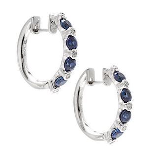 A Pair of 14 Karat White Gold, Sapphire and Diamond Hoop Earrings, 4.00 dwts.