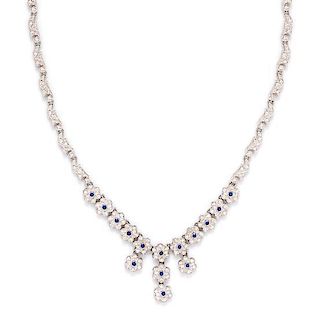 A 14 Karat White Gold, Diamond and Sapphire Necklace, 19.60 dwts.