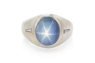 A 14 Karat White Gold, Star Sapphire and Diamond Ring, 9.00 dwts.