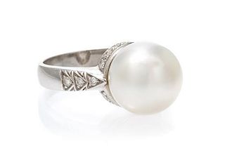 An 18 Karat White Gold Cultured South Sea Pearl and Diamond Ring, 5.70 dwts.
