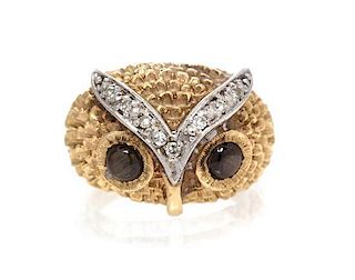 A 14 Karat Yellow Gold, Black Star Sapphire and Diamond Owl Ring, 6.20 dwts.