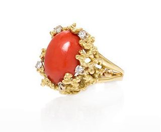 * An 18 Karat Yellow Gold, Coral and Diamond Ring, 10.65 dwts.