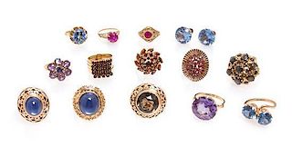 * A Collection of Gold Mulit Gem Rings and Earclips, 54.70 dwts.