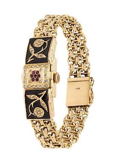 * A Vintage Yellow Gold, Garnet, Seed Pearl and Enamel Surprise Watch, 26.15 dwts.