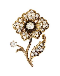 An Antique Yellow Gold and Diamond Flower Brooch, 6.30 dwts.