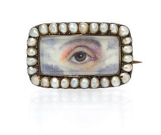An Antique Yellow Gold and Seed Pearl Lover's Eye Brooch, 2.50 dwts.