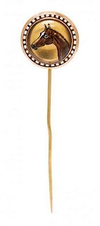 A Rose Gold Essex Crystal Horse Motif Stick Pin, 5.70 dwts.