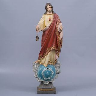 Sagrado Corazón de Jesús. Siglo XX. En talla de madera. Con capelo de cristal. Decorado con esmalte dorado.