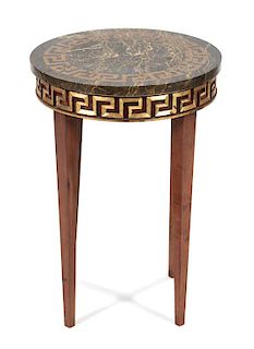 An Italian Directoire Style Occasional Table Height 22 1/2 x diameter 16 inches.