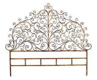 A Rococo Style Gilt Metal Scrollwork Headboard Height 67 x width 78 inches.