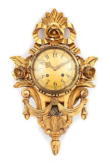An Exacta Swedish Cartel Style Carved Giltwood Clock Height 22 inches.