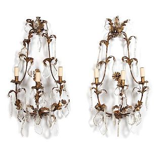 A Pair of Louis XV Style Gilt Metal and Crystal Three-Light Wall Sconces Height 32 inches.
