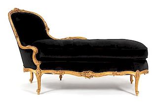 A Louis XV Style Giltwood Chaise Lounge Height 38 x width 66 x depth 28 inches.