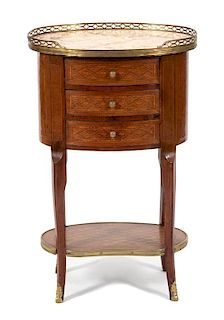A Louis XV/XVI Transitional Style Marquetry Table en Chiffonier Height 29 1/2 x width 18 3/4 x depth 13 1/2 inches.