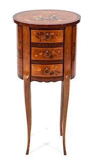 A Louis XV/XVI Transitional Style Marquetry Table en Chiffonier Height 28 1/4 x width 13 1/4 x depth 10 1/4 inches.