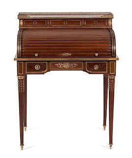 A Louis XVI Style Gilt Bronze Mounted Mahogany Bureau a Cylindre Height 40 1/2 x width 30 1/2 x depth 21 1/4 inches.