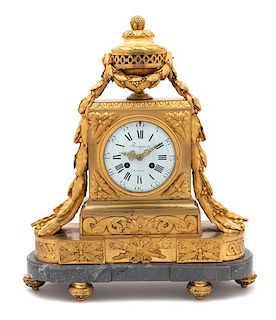 A Louis XVI Style Gilt Bronze Mantel Clock Height 19 x width 16 x depth 6 inches.