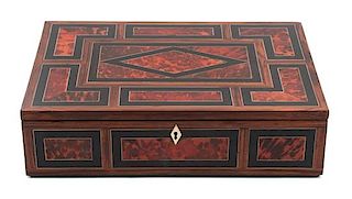 A Continental Tortoiseshell, Ebony and Rosewood Traveling Desk Height 4 1/4 x width 16 x depth 12 inches.