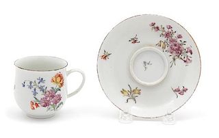 A Chelsea Porcelain Cup and Trembleuse Saucer Diameter of saucer 5 inches.