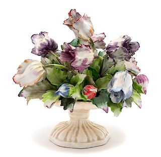 An English Porcelain Floral Group of Tulips Height 9 x diameter 8 inches.