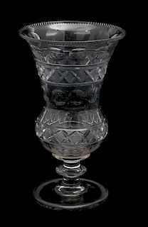 An English Cut Glass Footed Vase Height 9 1/4 inches.