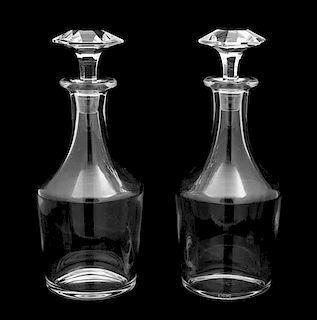 A Pair of Baccarat Crystal Stoppered Decanters Height 11 inches.
