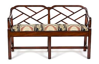 A Chinese Chippendale Style Mahogany Bench Height 30 1/2 x width 49 x depth 17 inches.
