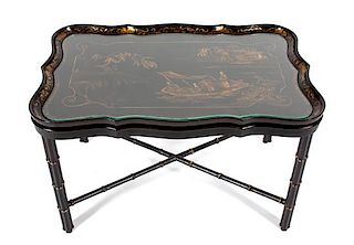 A Regency Style Black Lacquer and Gilt Chinoiserie Decorated Tray Top Table Height 20 3/4 x width 33 3/4 x depth 22 inches.