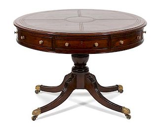 A Regency Inlaid Mahogany Drum Table Height 29 1/4 x diameter 42 1/2 inches.