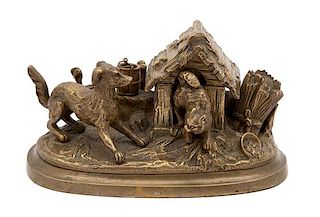 A Bronze Inkwell of Dog Barking at a Cat in a Doghouse Height 4 x width 6 1/2 x depth 3 1/4 inches.