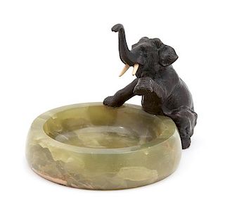A Green Onyx Ashtray Mounted with a Bronze Elephant Height 6 x diameter 6 1/2 inches.