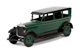 A Scale Model of a 1920's Vintage Car Height 10 x width 8 1/2 x depth 25 inches.