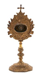 A Continental Gilt Metal Reliquary Height 13 x width 5 x depth 4 inches.