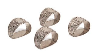 A Set of Four Scottish Silver Napkin Rings, George & John Morgan, Glasgow, 1900, retailed by Alfred Dunhill, in fitted case