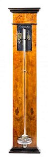 A Biedermeier Parcel Ebonized Burlwood Barometer Height 40 1/4 inches.