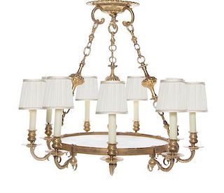 An Empire Style Gilt Bronze and Alabaster Nine-Light Chandelier Diameter 28 inches.