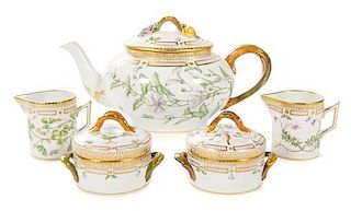 A Royal Copenhagen Flora Danica Tea Service Height of teapot 6 1/4 inches.