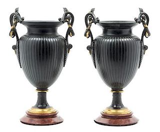 A Pair of Neoclassical Cast Metal Urns Height 13 1/4 inches.
